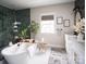 Spa-like bathroom with herringbone tile shower and freestanding tub at Lot 42 Watercourse Way # Hawthorne, Belmont, NC 28012