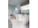 Modern bathroom with hexagon tile floor, walk-in shower, and soaking tub at Lot 42 Watercourse Way # Hawthorne, Belmont, NC 28012
