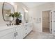 Modern bathroom with double vanity, frameless shower, and walk-in closet at Lot 41 Watercourse Way # Savanh, Belmont, NC 28012