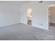 Spacious bedroom with gray carpet and access to a bathroom at Lot 41 Watercourse Way # Savanh, Belmont, NC 28012