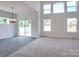 Bright dining room with sliding glass doors and tile flooring at Lot 41 Watercourse Way # Savanh, Belmont, NC 28012