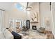 Spacious living room with stone fireplace and high ceilings at Lot 41 Watercourse Way # Savanh, Belmont, NC 28012