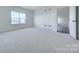Spacious bedroom with carpeted flooring and a large window at Lot 51 Watercourse Way # Arcadia, Belmont, NC 28012