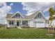 One-story house with gray siding, white trim, and a two-car garage at Lot 51 Watercourse Way # Arcadia, Belmont, NC 28012