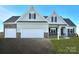 Two-story house with light beige vinyl siding and a two-car garage at Lot 51 Watercourse Way # Arcadia, Belmont, NC 28012