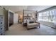 Main bedroom with a canopy bed and access to a walk-in closet at Lot 51 Watercourse Way # Covington, Belmont, NC 28012