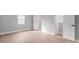 Spacious bedroom with wood-look flooring and access to a full bathroom at 112 Pine St, Shelby, NC 28152