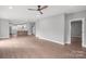 Open concept living space with hardwood floors and kitchen view at 112 Pine St, Shelby, NC 28152