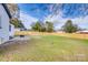 Spacious backyard with wooden fence and grassy lawn at 13100 S Church St, Huntersville, NC 28078