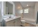 Modern bathroom with updated vanity, bathtub, and LED mirror at 13100 S Church St, Huntersville, NC 28078