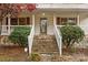 Home features stone steps leading to a front porch with a white railing at 1622 Ebinport Rd, Rock Hill, SC 29732