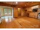 Functional kitchen with wood cabinets and access to deck at 1622 Ebinport Rd, Rock Hill, SC 29732