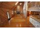 Open living area with hardwood floors, vaulted wood ceiling, and loft at 1622 Ebinport Rd, Rock Hill, SC 29732