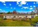 Home with deck overlooking the backyard at 227 Grassy Meadow Ln, Statesville, NC 28625