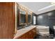 Bathroom with double vanity and corner tub at 227 Grassy Meadow Ln, Statesville, NC 28625