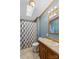 Clean bathroom with updated vanity and shower at 227 Grassy Meadow Ln, Statesville, NC 28625