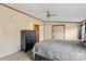 Bright bedroom with a dresser and ceiling fan at 227 Grassy Meadow Ln, Statesville, NC 28625
