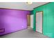 Bedroom with purple and green walls at 227 Grassy Meadow Ln, Statesville, NC 28625