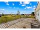 Relaxing wooden deck overlooking a spacious backyard at 227 Grassy Meadow Ln, Statesville, NC 28625