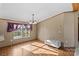 Bright dining area with window and access to kitchen at 227 Grassy Meadow Ln, Statesville, NC 28625