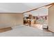 Open concept dining area with wood flooring and kitchen access at 227 Grassy Meadow Ln, Statesville, NC 28625