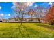 Single-wide manufactured home with a large yard and RV parking at 227 Grassy Meadow Ln, Statesville, NC 28625