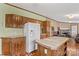 Spacious kitchen with ample cabinetry, an island, and modern appliances at 227 Grassy Meadow Ln, Statesville, NC 28625