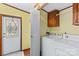 Convenient laundry room with washer, dryer, and exterior access at 227 Grassy Meadow Ln, Statesville, NC 28625