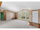 Bright living room with large window and parquet flooring at 227 Grassy Meadow Ln, Statesville, NC 28625