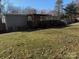 Gray house exterior with wooden deck at 3222 Ole Country Ln, Claremont, NC 28610