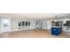 Open concept kitchen with a blue island and white cabinets at 3700 Pinecrest Dr, Gastonia, NC 28056