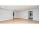 Spacious living room with light gray walls and light brown wood flooring at 3700 Pinecrest Dr, Gastonia, NC 28056