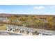 Aerial view of townhouses and surrounding landscape at 3950 Rothwood Ln, Harrisburg, NC 28075