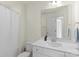 Clean bathroom with a shower/tub combo and vanity at 3950 Rothwood Ln, Harrisburg, NC 28075