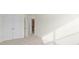 Spacious bedroom with a closet and access to a hallway and upper level at 3950 Rothwood Ln, Harrisburg, NC 28075