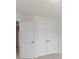 Bedroom with double door closet and access to a hallway at 3950 Rothwood Ln, Harrisburg, NC 28075