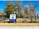 Fenced dog park with Harrisburg Village signage at 3950 Rothwood Ln, Harrisburg, NC 28075