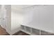Neat entryway with built-in bench and hooks for storage at 3950 Rothwood Ln, Harrisburg, NC 28075