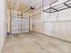 Garage with overhead storage at 3950 Rothwood Ln, Harrisburg, NC 28075