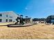 Community playground with playset and slide at 3950 Rothwood Ln, Harrisburg, NC 28075