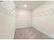 Large walk-in closet with wire shelving at 3950 Rothwood Ln, Harrisburg, NC 28075
