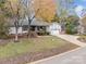 Single story home with attached garage and landscaped yard at 4080 Point Clear Dr, Tega Cay, SC 29708