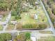 Aerial view of property showing house, detached garage, and large lot at 4356 Charles Raper Jonas Hwy, Alexis, NC 28006