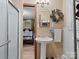 Simple bathroom with pedestal sink and shower at 4356 Charles Raper Jonas Hwy, Alexis, NC 28006