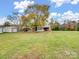 Brick ranch house with large backyard and outbuildings at 4356 Charles Raper Jonas Hwy, Alexis, NC 28006