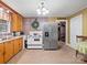 Kitchen with wood cabinets and white stove at 4356 Charles Raper Jonas Hwy, Alexis, NC 28006
