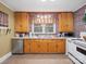 Kitchen with wood cabinets and stainless steel appliances at 4356 Charles Raper Jonas Hwy, Alexis, NC 28006