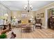 Living area with chandelier and hardwood floors at 4356 Charles Raper Jonas Hwy, Alexis, NC 28006