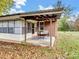 Cozy patio with brick columns and a small table at 4356 Charles Raper Jonas Hwy, Alexis, NC 28006