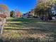 Large backyard with a fenced area and a view of the house at 4541 Hall Dairy Rd, Claremont, NC 28610
